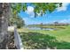 Peaceful pond view, seen from the yard of the property at 13437 Beechberry Dr, Riverview, FL 33579