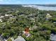 Beautiful home with pool is surrounded by lush trees with intercoastal views at 13598 Park Blvd, Seminole, FL 33776