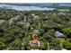 Gorgeous property in a secluded area, surrounded by mature trees and nearby waterways at 13598 Park Blvd, Seminole, FL 33776