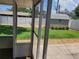Patio view to backyard shed, landscaping, and patio at 13725 Bermuda Dr, Seminole, FL 33776