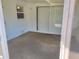 Enclosed patio with white interior and a sliding glass door to the outdoors at 13725 Bermuda Dr, Seminole, FL 33776