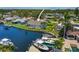 Waterfront home with backyard deck, dock, and lift, perfect for boating and enjoying the scenic canal views at 1382 52Nd Ne Ave, St Petersburg, FL 33703