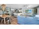 Bright, open concept living and dining area with a breakfast bar and waterfront views at 1382 52Nd Ne Ave, St Petersburg, FL 33703