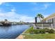 Gorgeous waterfront view with private dock, lush landscaping, and serene canal views at 1382 52Nd Ne Ave, St Petersburg, FL 33703