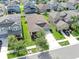Aerial shot of a residential neighborhood highlighting the neatly manicured lawns and attractive landscaping at 13912 Painted Bunting Ln, Riverview, FL 33579