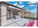 Inviting screened patio area complete with a hot tub and comfortable seating arrangement at 13912 Painted Bunting Ln, Riverview, FL 33579