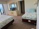 Bedroom with two beds and ocean view at 14950 Gulf Blvd # 603, Madeira Beach, FL 33708