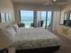 Spacious bedroom with a view of the beach and ocean at 14950 Gulf Blvd # 603, Madeira Beach, FL 33708