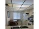 Compact kitchen featuring white appliances at 14950 Gulf Blvd # 603, Madeira Beach, FL 33708
