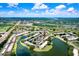 Scenic aerial view of the condo complex, with lush landscaping, tranquil ponds, and convenient parking areas at 172 Lakeview Way # 172, Oldsmar, FL 34677