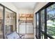 Bright laundry area with washer, dryer, and exterior views of the community at 172 Lakeview Way # 172, Oldsmar, FL 34677