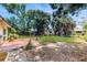 Spacious backyard with patio and lush greenery, providing a serene outdoor retreat at 1720 Chrysler Ave, Sarasota, FL 34234