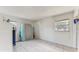 Empty room featuring tile floors, natural light and a closet, ready for customization at 1720 Chrysler Ave, Sarasota, FL 34234