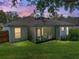 Backyard view of the screened in lanai at 18003 Arbor Crest Dr, Tampa, FL 33647