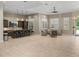 Large open area with bar seating, multiple seating areas, and great lighting at 18003 Arbor Crest Dr, Tampa, FL 33647