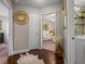 Open hallway showcasing views of the bathroom and living area, enhancing flow at 18003 Arbor Crest Dr, Tampa, FL 33647