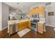 Contemporary kitchen featuring stainless steel appliances, wood cabinets, open design for easy entertaining at 18003 Arbor Crest Dr, Tampa, FL 33647