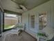 Welcoming screened-in lanai with backyard access at 18003 Arbor Crest Dr, Tampa, FL 33647