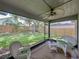 Outdoor lanai with views of the backyard at 18003 Arbor Crest Dr, Tampa, FL 33647
