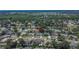 Wide aerial view of a residential neighborhood showcasing a home with mature trees and well-maintained landscaping at 1801 Sagebrush Rd, Plant City, FL 33566