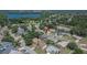 Stunning aerial view of a charming community with a home featuring a private pool and beautifully landscaped yard at 1801 Sagebrush Rd, Plant City, FL 33566