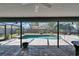 Screened-in pool with brick patio and backyard at 1801 Sagebrush Rd, Plant City, FL 33566