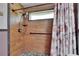 Updated shower featuring brown tile, pebble floor, and a shower head with wand at 1801 Sagebrush Rd, Plant City, FL 33566