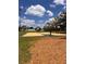 Outdoor basketball court featuring multiple hoops, nets and court lines at 1809 Elmwood Dr, Oldsmar, FL 34677
