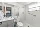 A stylish bathroom featuring a glass shower and modern fixtures, providing a spa-like experience at 1809 Elmwood Dr, Oldsmar, FL 34677