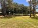 Fenced dog park area for residents to exercise and socialize their pets at 1809 Elmwood Dr, Oldsmar, FL 34677