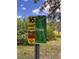 Sign for hole 16, a par 3 with a 440-foot course at 1809 Elmwood Dr, Oldsmar, FL 34677