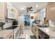 A well-equipped kitchen with modern appliances and a view into the adjoining living area at 1809 Elmwood Dr, Oldsmar, FL 34677