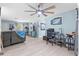 A spacious living room with wood floors and stylish furnishings, creating a warm and welcoming atmosphere at 1809 Elmwood Dr, Oldsmar, FL 34677