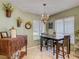 Charming dining area with tile floors, lots of natural light, and decorative wall features at 18107 Canal Pointe St, Tampa, FL 33647