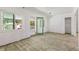 Inviting room with neutral walls, hardwood floors and natural light, ready for renovation and design at 1827 Oregon Ne Ave, St Petersburg, FL 33703