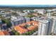 Eye-level aerial of a multi-Gathering complex with orange roofs and high-rise buildings in a dynamic urban environment at 200 4Th S Ave # 229, St Petersburg, FL 33701