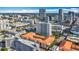 Inviting aerial view of a multi-Gathering complex with orange tile roofs surrounded by high-rise buildings and cityscape at 200 4Th S Ave # 229, St Petersburg, FL 33701