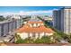 Attractive aerial view of apartments with orange tile roofs in a dense urban environment on a beautiful sunny day at 200 4Th S Ave # 229, St Petersburg, FL 33701
