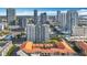 Spectacular aerial view of a multi-Gathering complex with orange tile roofs and surrounding urban high-rise buildings at 200 4Th S Ave # 229, St Petersburg, FL 33701