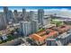 An aerial view of luxury condos in a vibrant urban neighborhood, near the ocean and marina at 200 4Th S Ave # 229, St Petersburg, FL 33701
