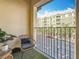 This condo features a charming balcony with comfortable seating and a vibrant street view at 200 4Th S Ave # 229, St Petersburg, FL 33701