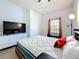 Bedroom featuring ample natural light and a sleek, minimalist style with hardwood floors at 200 4Th S Ave # 229, St Petersburg, FL 33701
