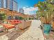Relax in this outdoor oasis with stylish seating, pergolas, and a view of nearby high-rise buildings at 200 4Th S Ave # 229, St Petersburg, FL 33701