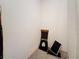 A storage area with a chair, black bag and window screen at 200 4Th S Ave # 229, St Petersburg, FL 33701