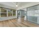 Enclosed lanai offers additional living space and scenic views of the grounds at 224 Aspen Cir # 224, Seminole, FL 33777