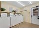 Community laundry room with modern washing machines and a bright interior at 224 Aspen Cir # 224, Seminole, FL 33777