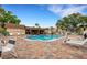 Community pool area with plenty of chairs and tables for residents to relax by the clear water at 224 Aspen Cir # 224, Seminole, FL 33777
