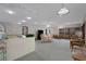 Spacious recreation room with a dining table, chairs, and scenic views at 224 Aspen Cir # 224, Seminole, FL 33777