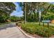 Welcoming entrance to Wedgewood featuring manicured landscaping and clear signage for Bilgore Grove Blvd at 2706 11Th Ct, Palm Harbor, FL 34684