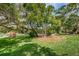 Community playground, lush green grass, and recreational areas for residents to enjoy at 2706 11Th Ct, Palm Harbor, FL 34684